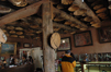 Woven baskets still hang from the rafters