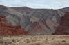 The layered, red and gray cliffs that line the river are a work of art