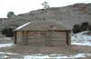 A Navajo hogan, or house, shivers in the snow