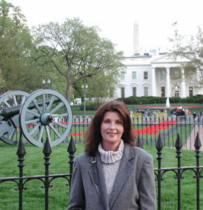 Across the street from the White House, Cherie poses in Lafayette Park
