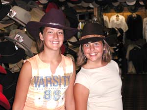 Kristin and Dani found many cowboys willing to lend them their hats